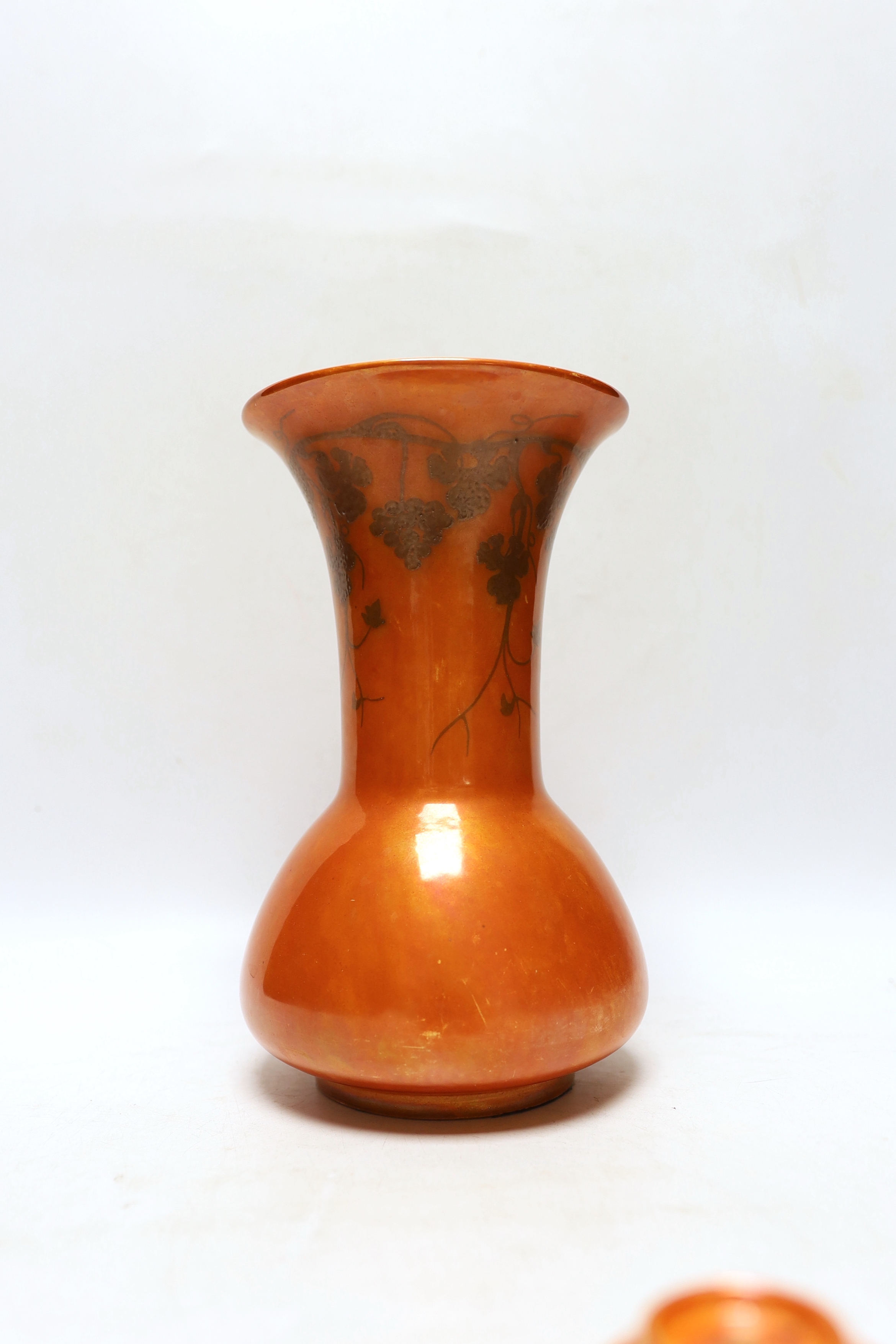 A Ruskin orange glazed vase (a.f) and three similar small bowls by Ruskin and Doulton, vase 23.5cm